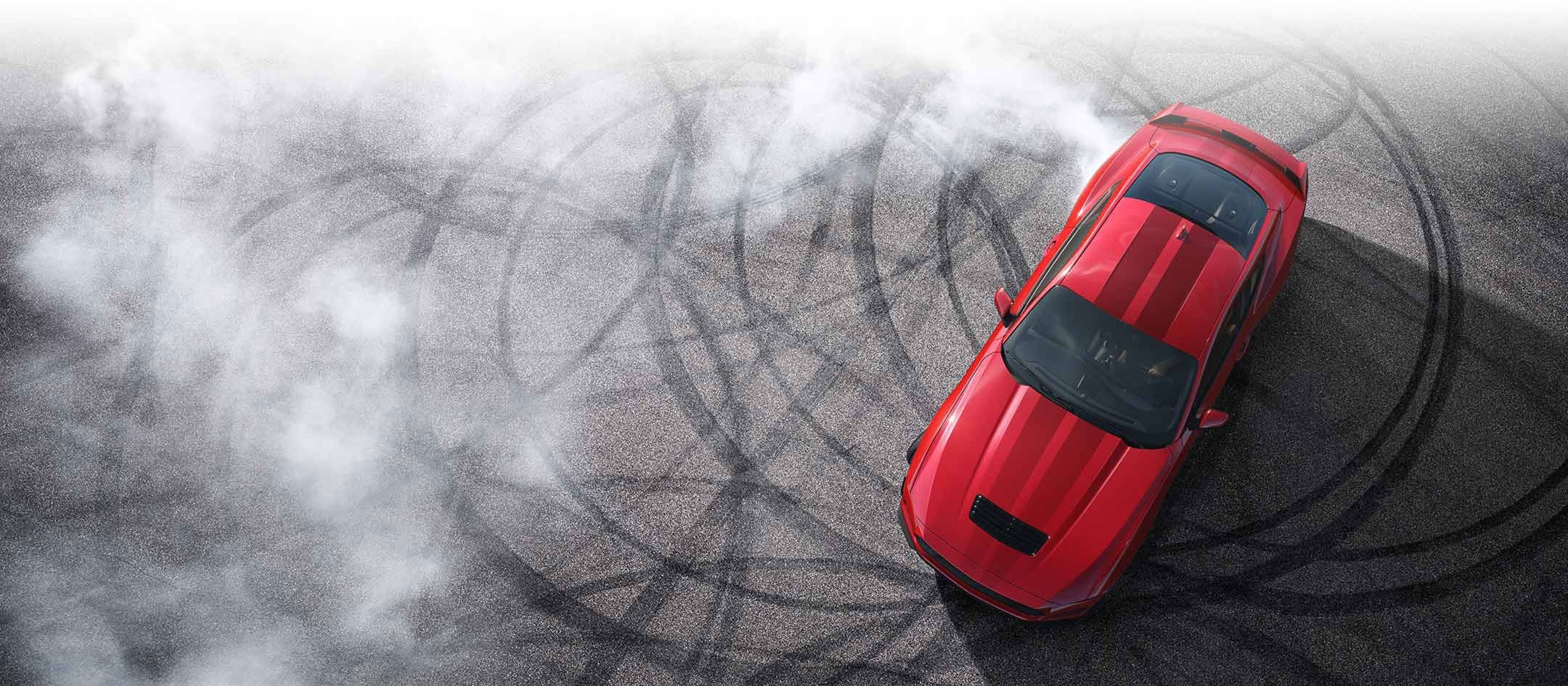 Overhead view of a 2024 Ford Mustang® model with tire tracks on pavement | Lombard Ford in Winsted CT