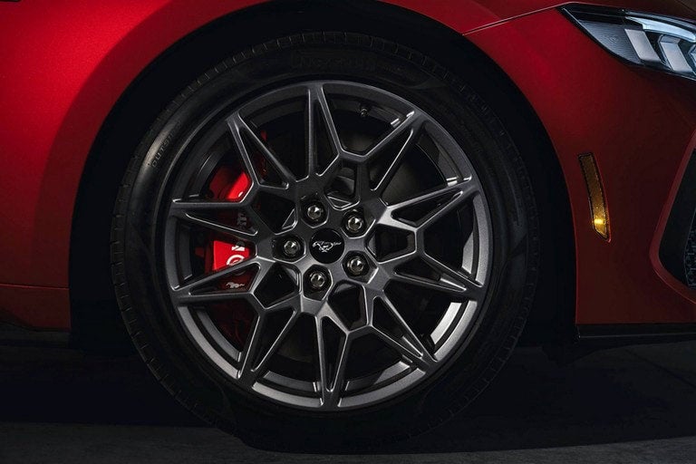 2024 Ford Mustang® model with a close-up of a wheel and brake caliper | Lombard Ford in Winsted CT